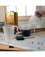 Three Stackable Mixing Cups being used to mix stain