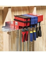 The Rockler 24'' Parallel Clamp Rack installed on wall