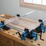 The Bench Block® Pipe Clamp Stabilizers
 holding a wood cabinet door