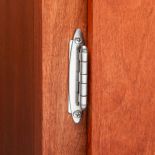 3/8'' Inset Free-Swinging Face-Mount Cabinet Hinge installed on cabinet