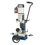 Sliding x-y axis table for precision placement of work pieces for boring mortises