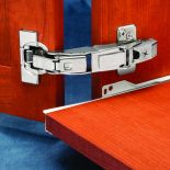 The Blum Clip Top 155&deg; Zero Protrusion Hinges, Nickel, Frameless, Full Overlay installed in wood cabinet