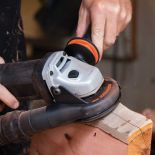 close up of Arbortech Power Carving Unit in use