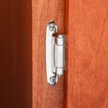 3/8'' Inset Self-Closing Face-Mount Cabinet Hinges installed on a cabinet