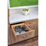 Photo of the 15 inch charging drawer in a brown kitchen. 