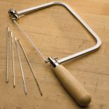 Hardwood handled coping saw and coping saw blades.