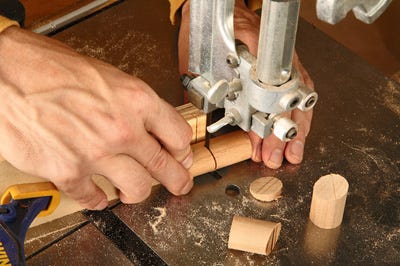 Cutting smokestacks for toy boat