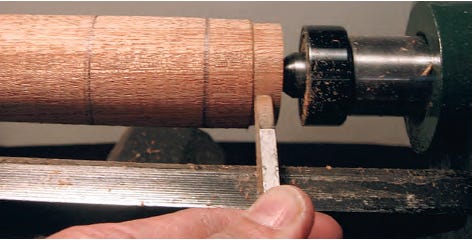Using parting tool to form screwdriver handle tenon