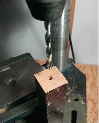 Drilling out center hole with drill press