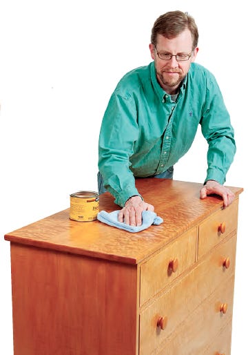 Applying shellac finish to dresser