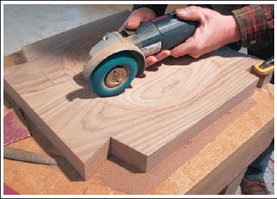 Smoothing seat contour with grinder attachment