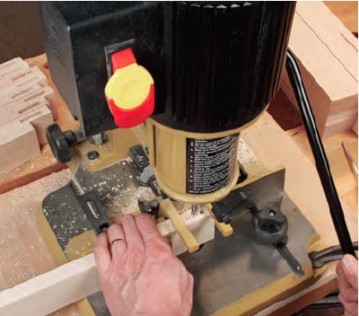 Using mortising machine to cut dresser joinery