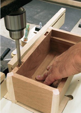 Drilling out holes for for installing soss hinge