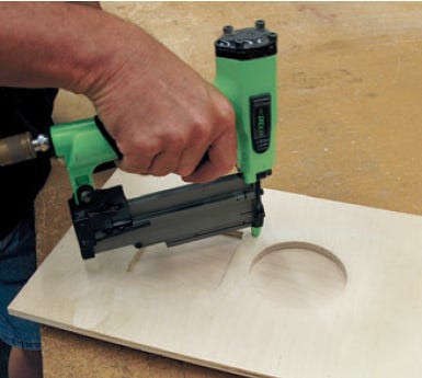 Securing drawer template to stock with nail gun