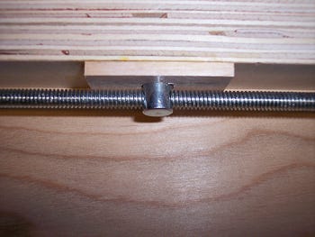 A cross dowel nut and bracket set-up