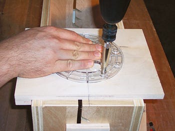 Drilling holes for router use on box turning jig