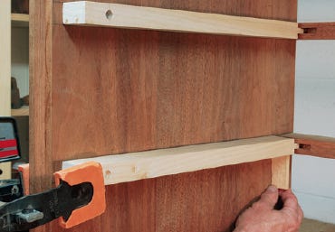 Installing drawer runners into highboy casing
