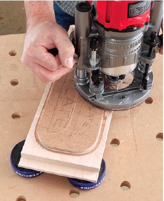 Using a template to route out tambour groove on box sides