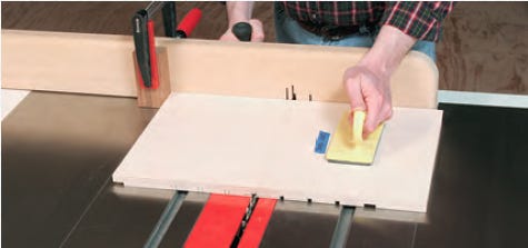 Plowing dadoes in sandpaper organizer side panels