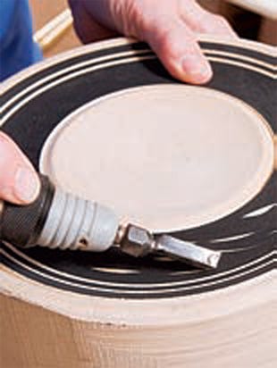 Practicing the carvings for a bowl rim