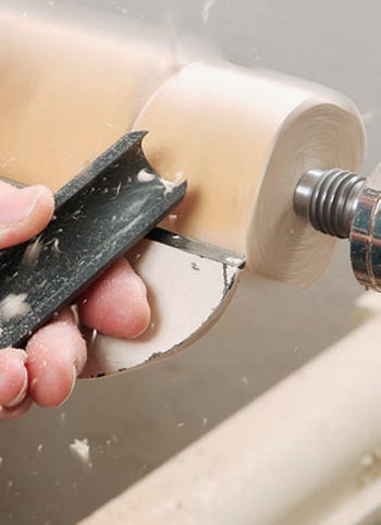 Roughing out chair leg blank with gouge