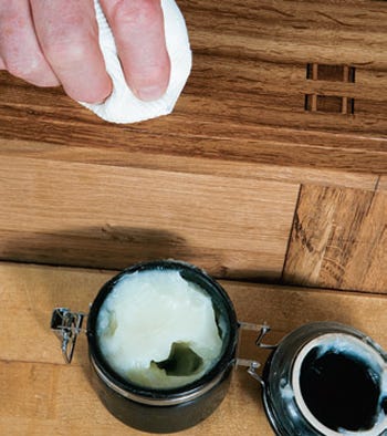 Applying beeswax polish with a cloth