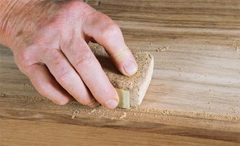 Sanding with a cork sanding block