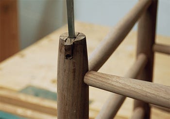 Parting rocker notch walls with a chisel