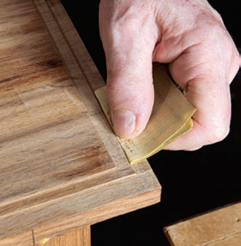 Removing shellac nibs with folded sandpaper