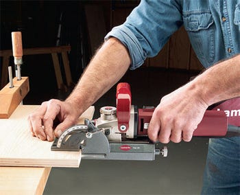 Barrel grip handle on a biscuit joiner