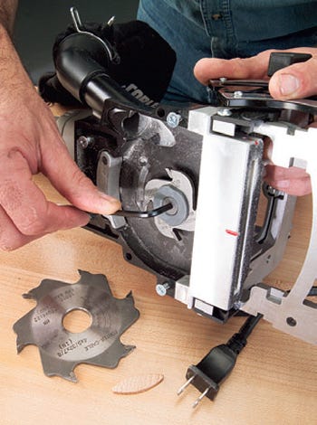 Changing blades in a biscuit joiner