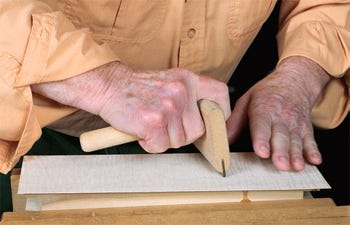 Reactivating hide glue with a cloth and iron