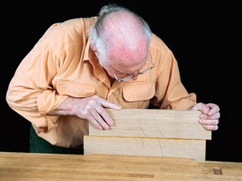 Rubbing the hide glue joints into place