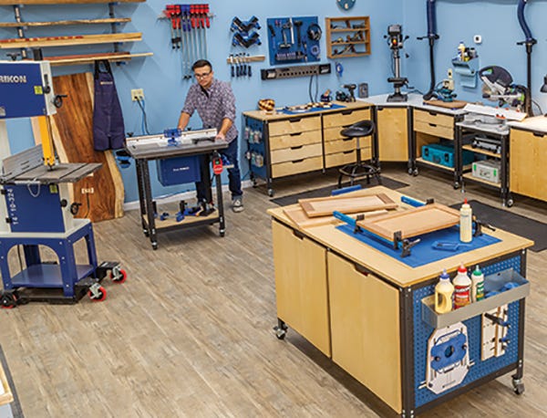 man setting up a woodworking shop