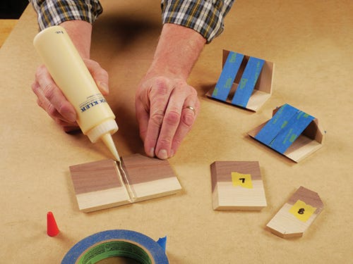 adding wood glue to mitered edges