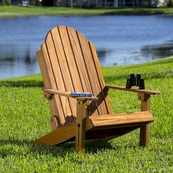 adirondack chair sitting outside on lawn