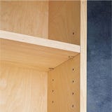 Kitchen cabinetry with adjustable shelving