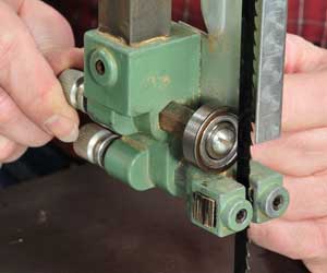 Making adjustments to the thrust bearings on a band saw