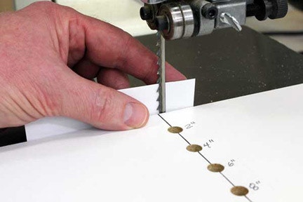 Checking blade teeth positioning against circle cutting jig
