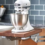 Kitchen cabinet attachment for raising and lowering small appliances