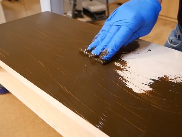Wiping a gel stain across a close grain hardwood project