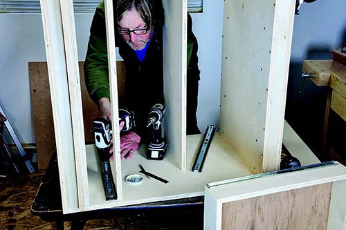 Adding drawer slides to lower carcass of tool cabinet casework