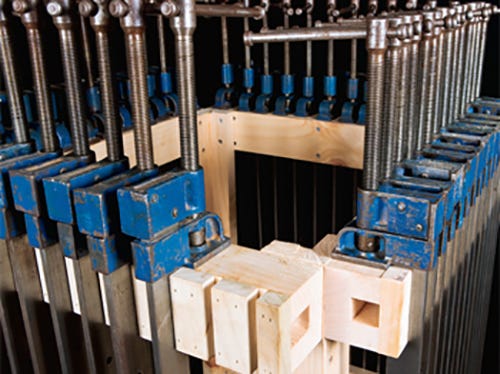 Storing clamps around a mobile shop cart