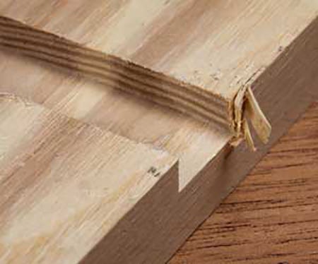 Close-up view of blowout at the end of a dado cut