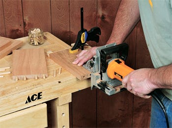 Cutting beside table stretcher joinery with dowel joint cutter