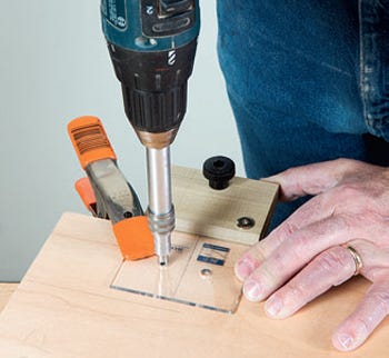 Using drilling guide to start hinge installation process