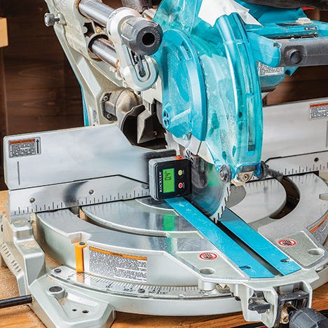 Checking miter saw angle with level box