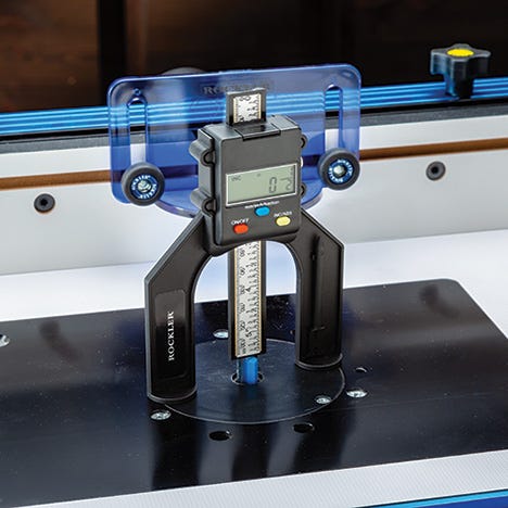 Checking router bit height with height gauge