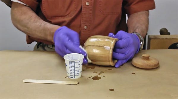 Wiping epoxy finish onto a turned jar project