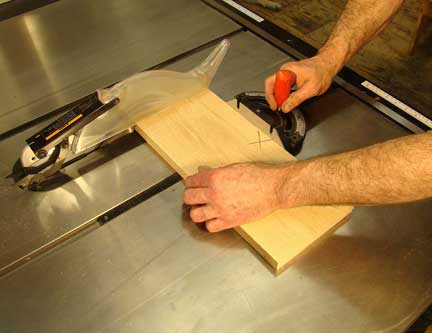 Using miter gauge to aid in board crosscutting